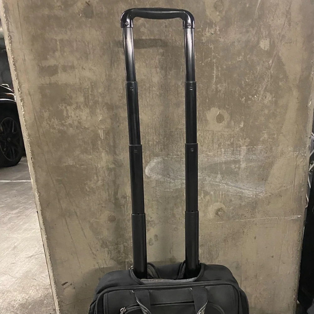 TUMI Rolling Briefcase Luggage